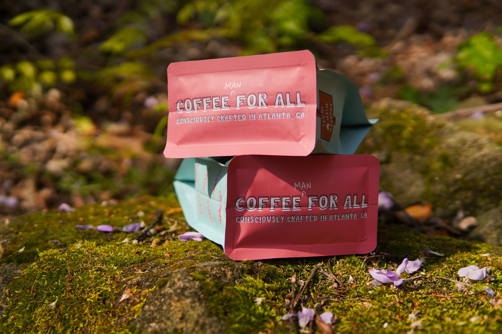 Colorful Pink and Blue Coffee Bags on grass
