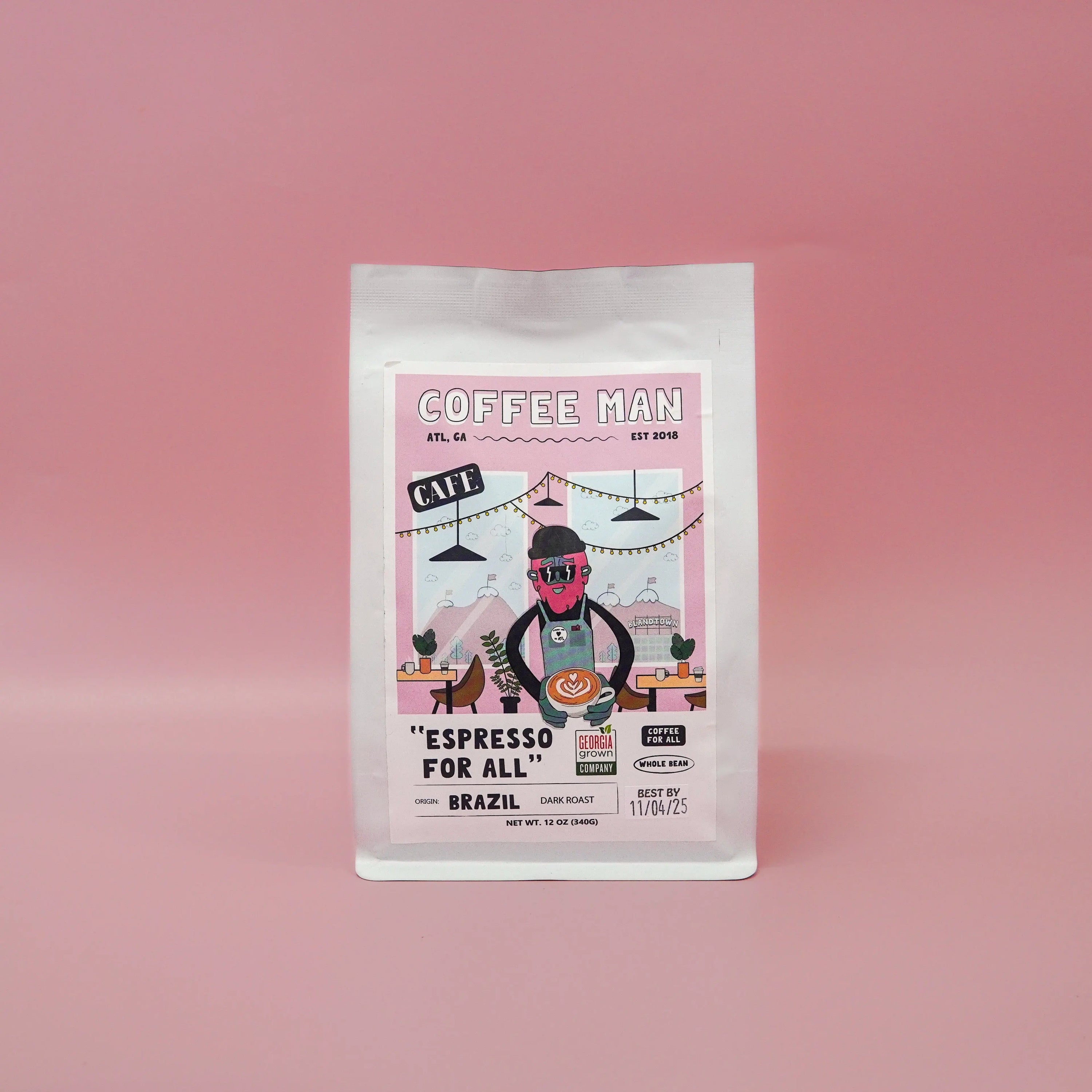 twelve ounce white Brazilian coffee bag with colorful doodles of a cartoon on the label