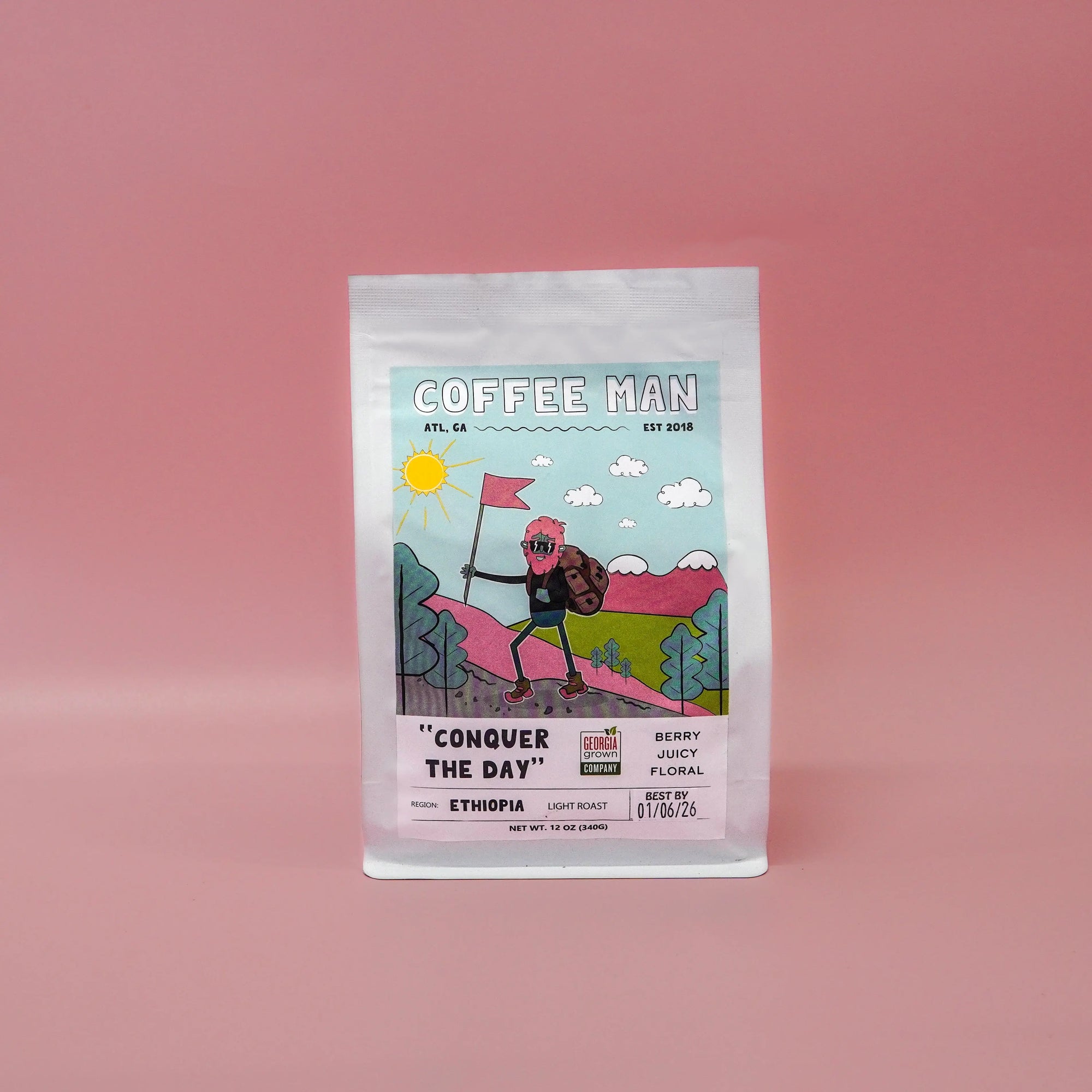 twelve ounce white coffee bag with Ethiopian coffee and colorful label