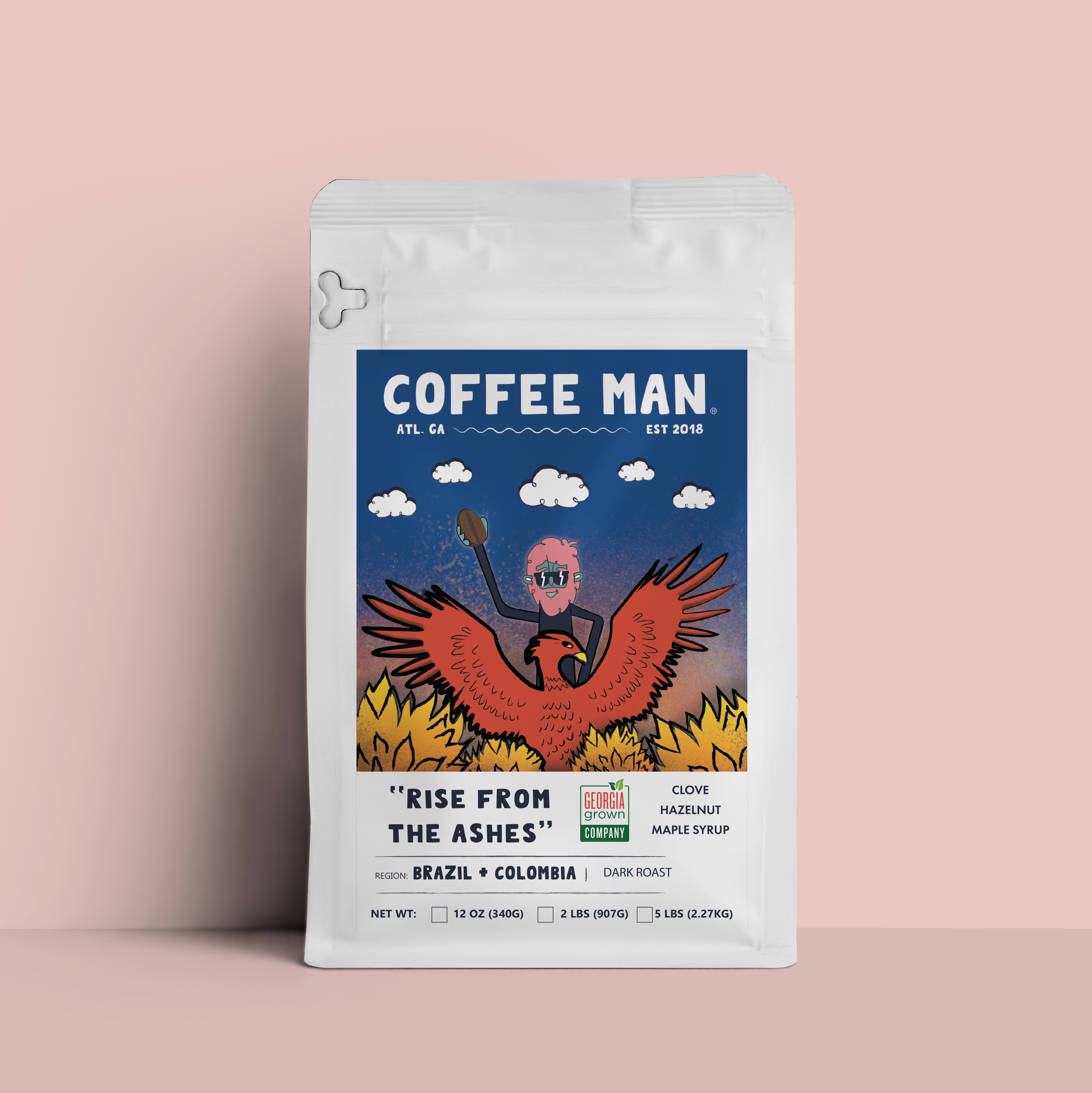 Coffee package with 'Coffee Man' branding on a pink background