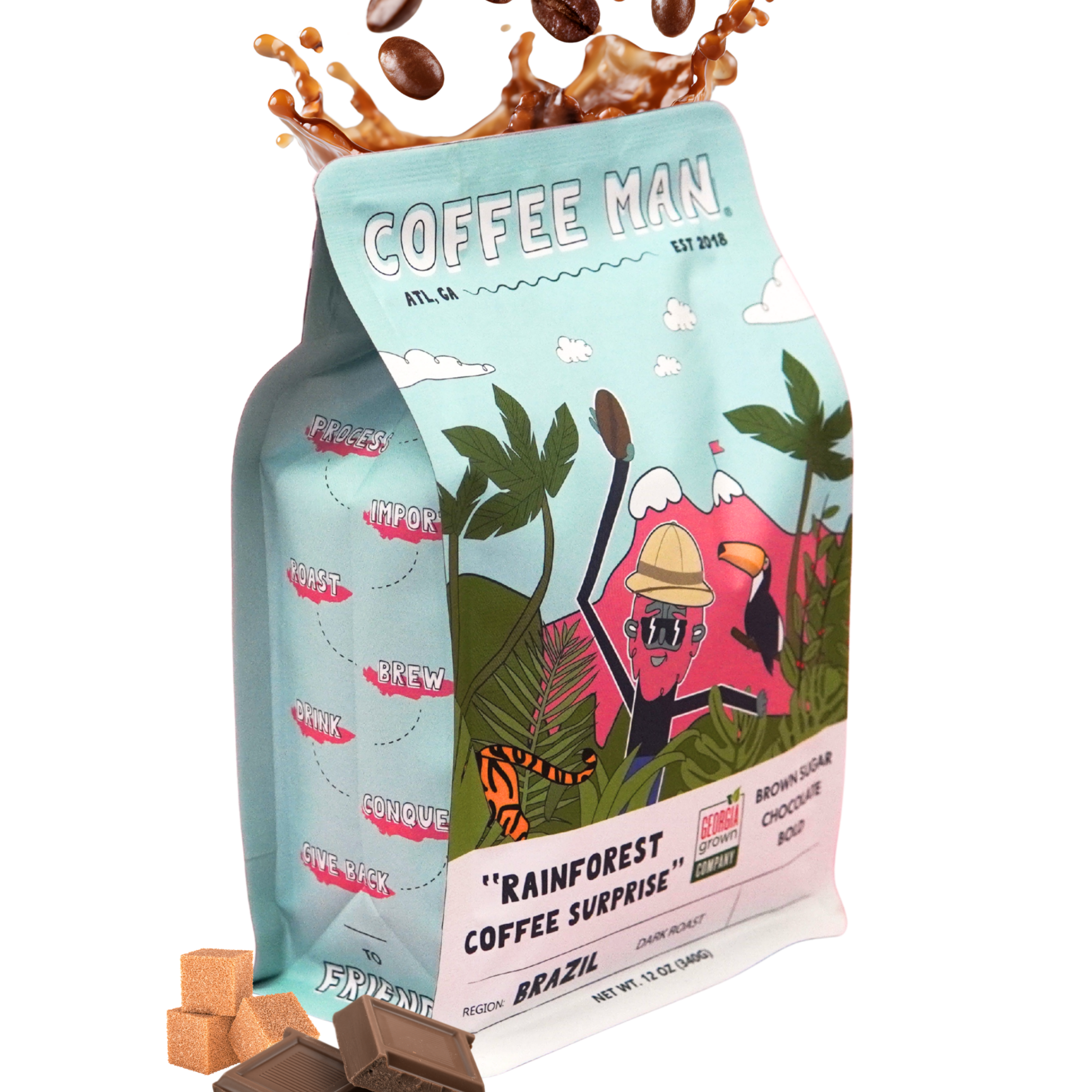 Coffee bag with coffee beans spilling out, featuring 'Coffee Man' branding and a rainforest design.