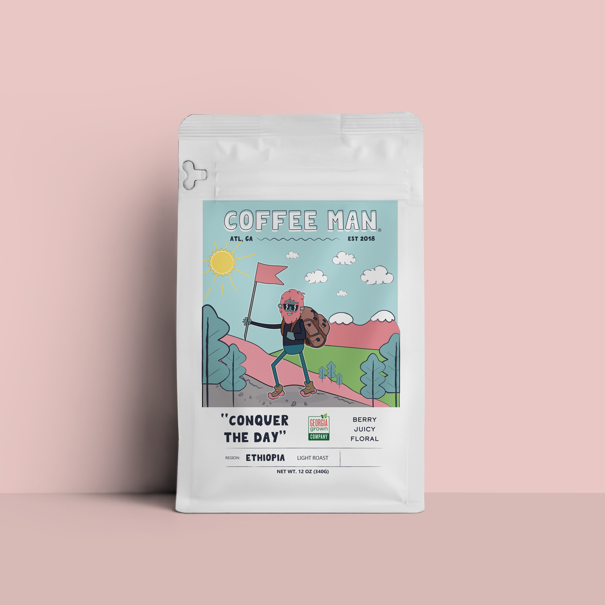 Coffee Man Ethiopia Conquer The Day 12oz bag of light roast coffee featuring fruity and floral notes.